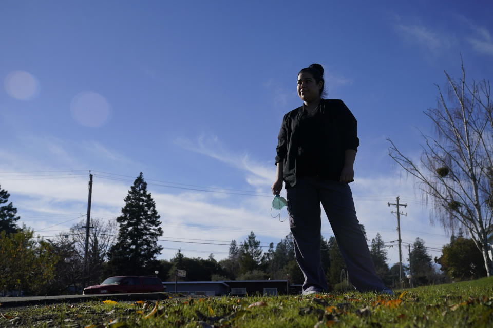 Lily Guido poses for photos in Sebastopol, Calif., Monday, Dec. 21, 2020. Taxpayers in families that include immigrants in the country illegally are celebrating the December federal relief bill after being excluded from the April relief stimulus. (AP Photo/Jeff Chiu)