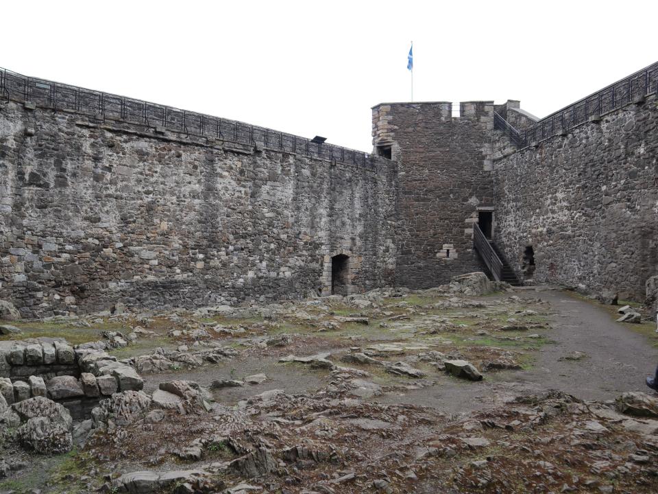 Courtyard and castle wall at Blackness Castle in Scotland.