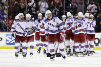 New York Rangers defenseman Jacob Trouba (8) reacts after his team lost to the New Jersey Devils in Game 7 of an NHL hockey Stanley Cup first-round playoff series Monday, May 1, 2023, in Newark, N.J. (AP Photo/Adam Hunger)