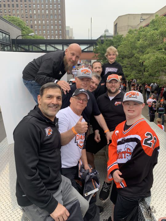 <em><strong>Brett and Chris Swenson along with members of the Bandits on their championship parade float in downtown Buffalo.</strong></em>