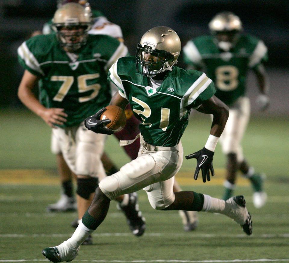 St. Vincent-St. Mary's Doran Grant scores a first-quarter touchdown against Walsh Jesuit, Friday, Oct. 8, 2010.