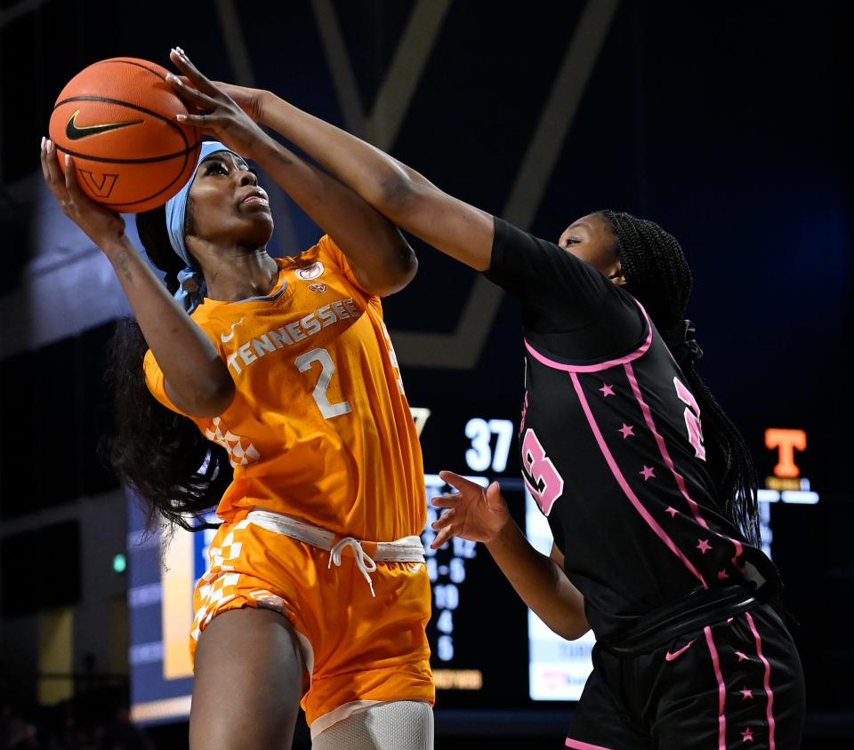 Tennessee forward Rickea Jackson (2) is fouled by Vanderbilt guard Iyana Moore (23) going to the basket during the second half of an NCAA college basketball game Sunday, Feb.18, 2024, in Nashville, Tenn. Tennessee won 86-61.