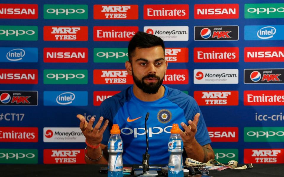  India's Virat Kohl during the press conference  - Credit:  REUTERS