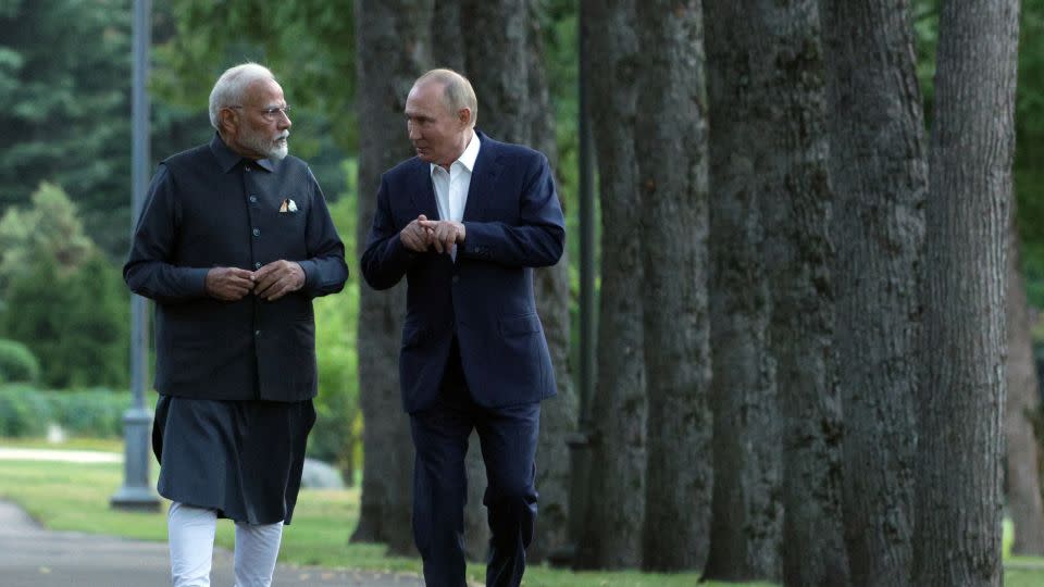 Russia's President Vladimir Putin and Indian Prime Minister Narendra Modi take a walk during an informal meeting near Moscow, on July 8, 2024. - Gavrill Grigorov/Pool/AFP/Getty Images