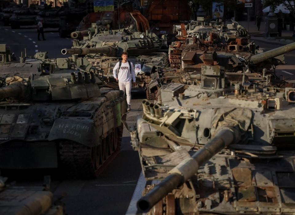 Destroyed Russian military vehicles are located on the main street Khreshchatyk to mark Independence Day (Reuters)