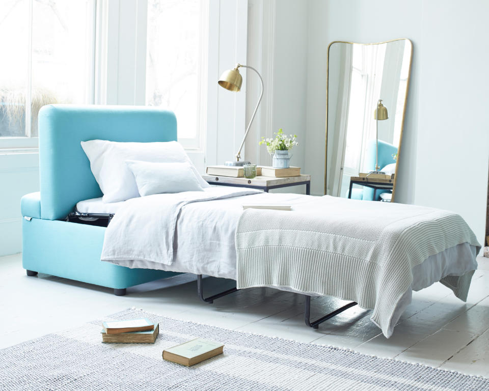 4. Turn your living space into a pop-up guest room with a sofa bed