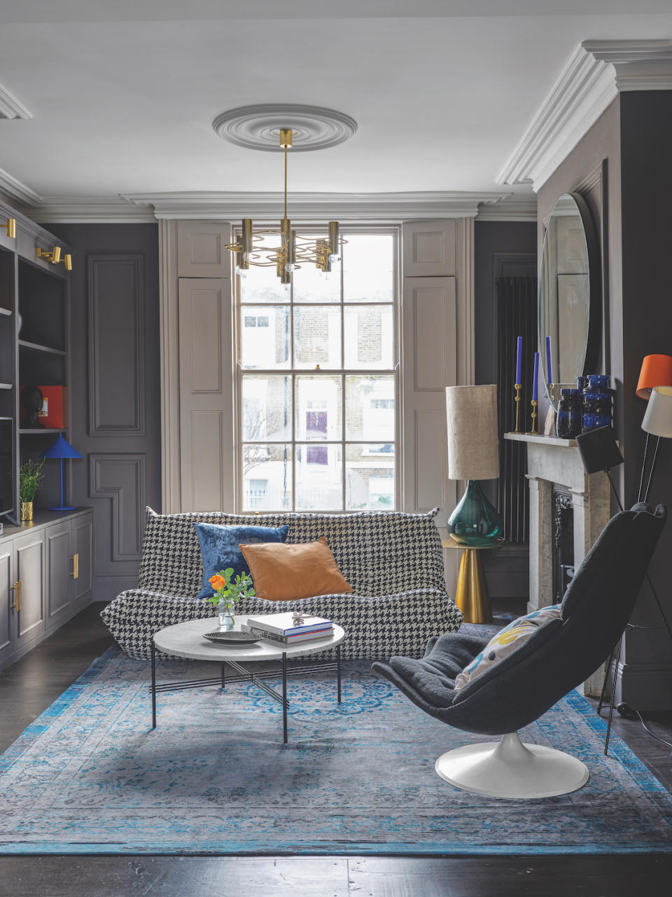 grey living room with houndstooth Togo sofa