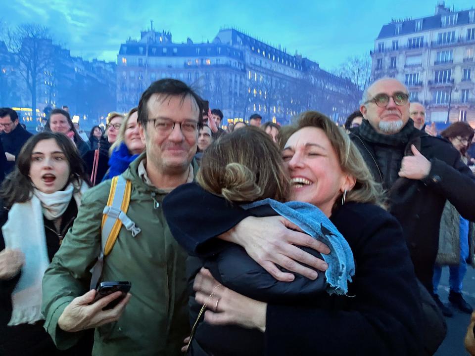 Pro-abortion supporters hug each other  in Paris, Monday, March 4, 2024.