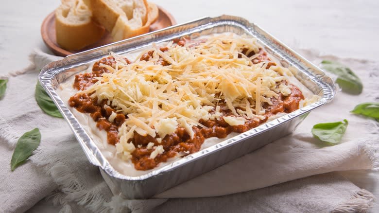 Frozen lasagna in metal tray