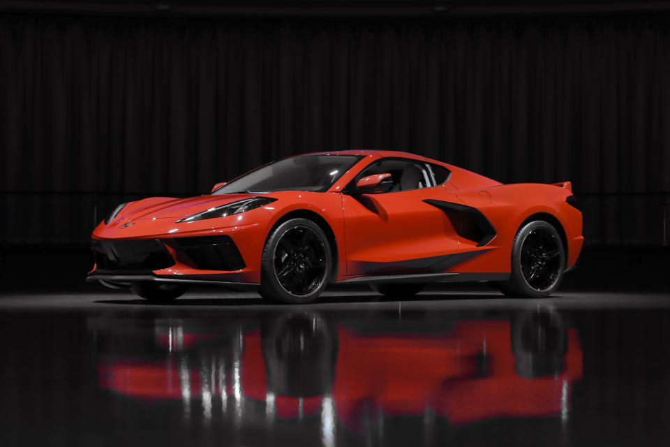 This June 24, 2019, photo shows a pre-production 2020 Chevrolet Corvette automobile in Warren, Mich. The mid-engine C8, the flagship of GM's Chevrolet brand, will have the weight balance and center of gravity of a race car, rivaling European counterparts and leaving behind sports sedans and ever-more-powerful muscle cars that were getting close to outperforming the current 'Vette. (AP Photo/Paul Sancya)