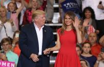 <p>For President Trump's rally in Melbourne, Florida, Melania opted for this bright red dress by Alexander McQueen.</p>