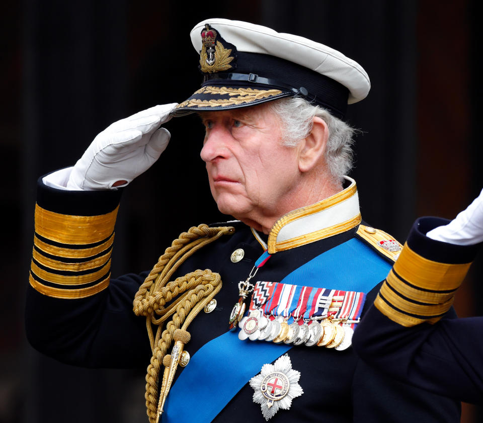 <p>King Charles III was clearly emotional as he saluted his mother Queen Elizabeth II's coffin as he attends her Committal Service at St George's Chapel, Windsor Castle following her death on 8 September. (Getty)</p> 