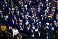 <p>The American athletes kept it classic in 1992 with blue peacoats and white hats. (Getty) </p>
