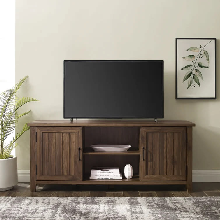 Oropeza TV Stand in brown wood