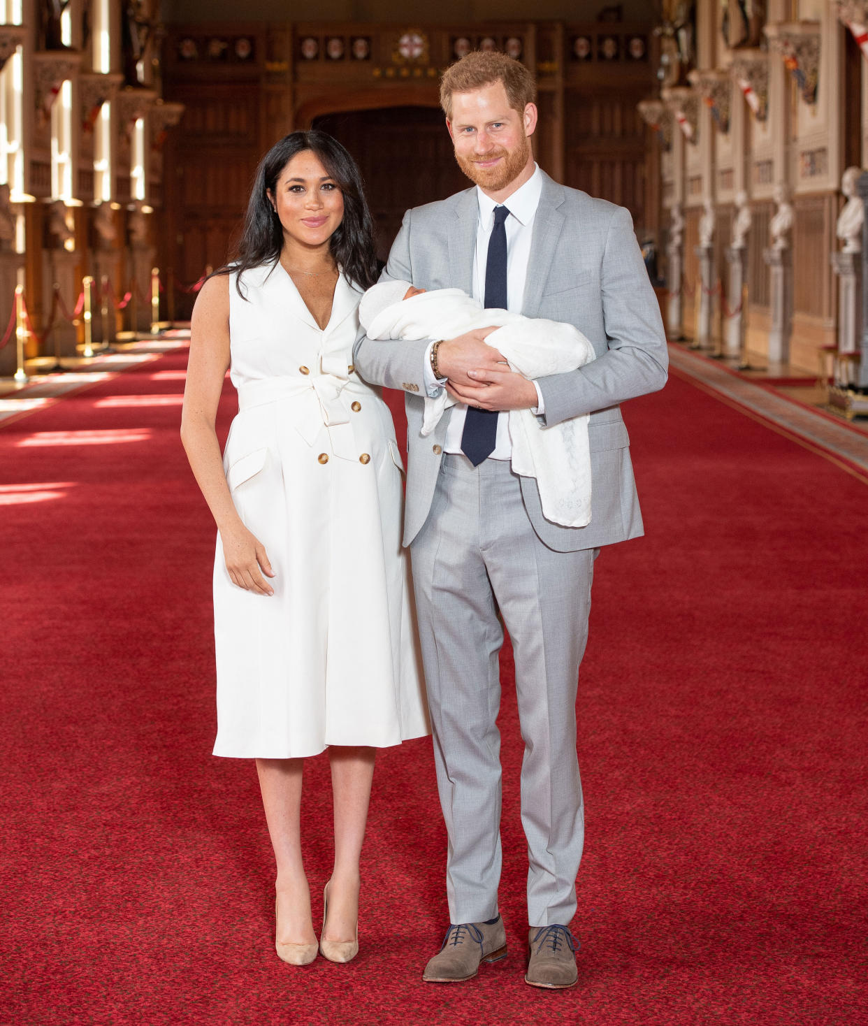 The Duke and Duchess of Sussex with their baby son, who was born on Monday morning, during a photocall in St George's Hall at Windsor Castle in Berkshire. Photo: AAP