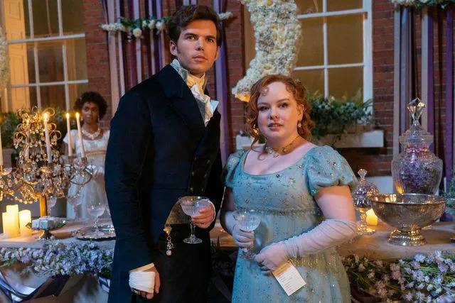 <p>Liam Daniel/Netflix</p> Luke Newton as Colin Bridgerton, Nicola Coughlan as Penelope Featherington in 'Bridgerton' season 3