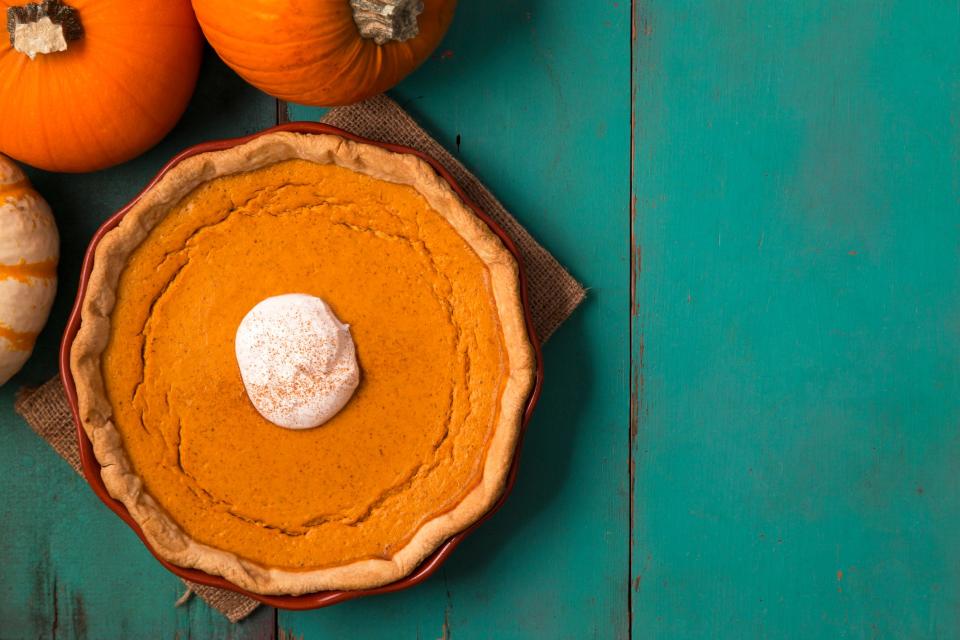 Refrigerate pumpkin pie to prevent further cracking. Or cover with whipped cream and dust with cinnamon.