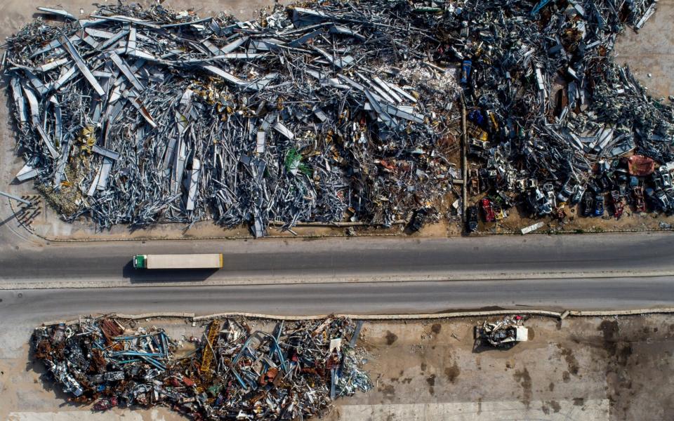 The blast flattened dozens of warehouses at the port, through which most Lebanon imports most of its goods - WAEL HAMZEH/EPA-EFE/Shutterstock