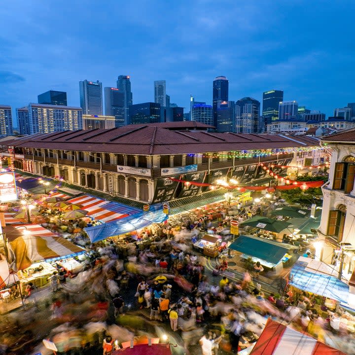 Chinatown Street Market in Singapore at night.