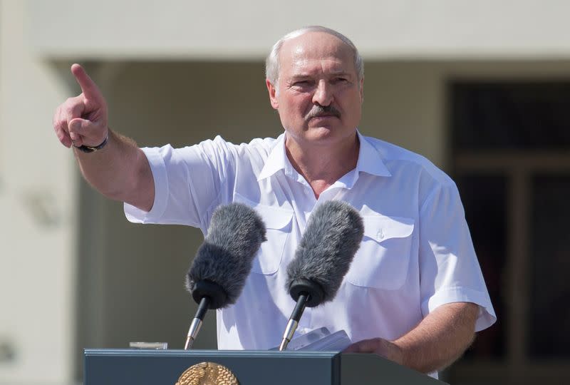 Belarusian President Lukashenko delivers a speech during a rally of his supporters in Minsk