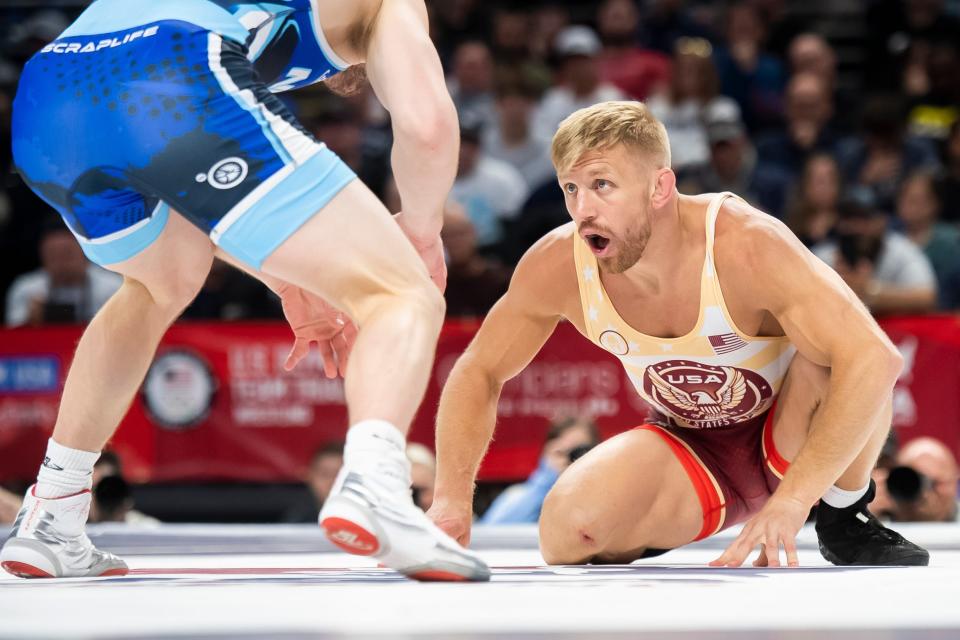 Kyle Dake (right) wrestles Jason Nolf in the 74-kilogram best-of-three championship series during the U.S. Olympic Team Trials at the Bryce Jordan Center April 20, 2024, in State College. Dake won the first bout, 4-1, and claimed the Olympics berth with a 3-1 win in the second match.