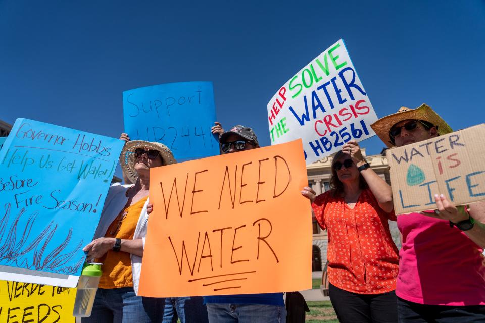 Rio Verde Foothills residents protest as they advocate for the passage of House Bills 2561 and 2441 at the Arizona State Capitol in Phoenix on April 26, 2023.