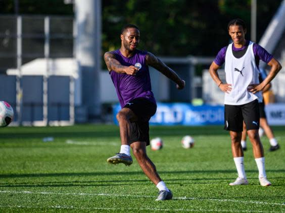 Raheem Sterling trains in Hong Kong (AFP/Getty)