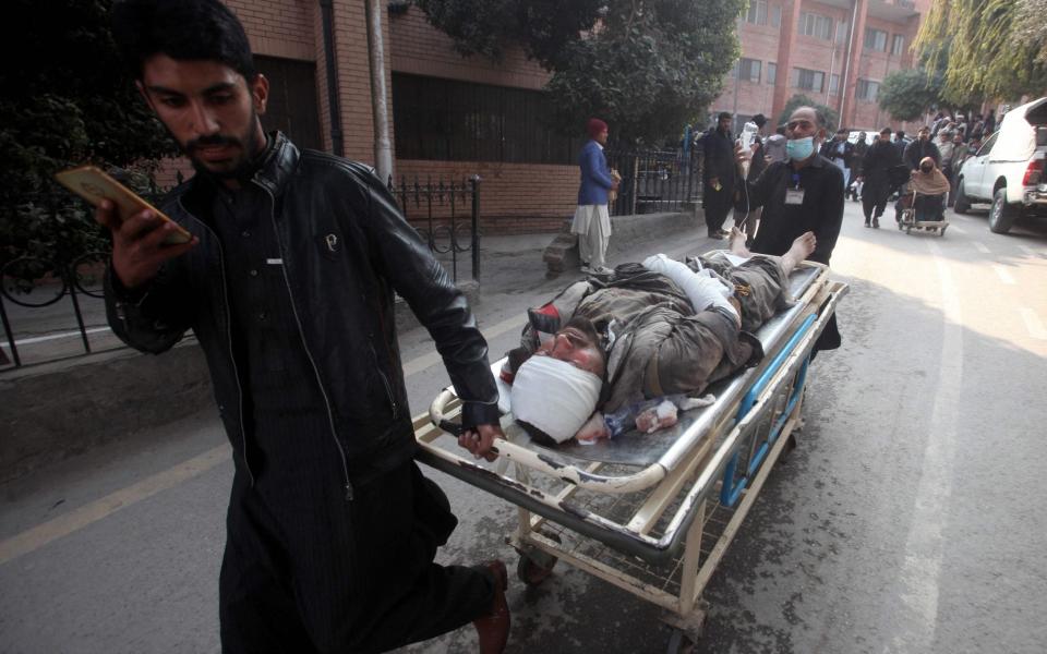 Pakistan mosque bombing Peshawar Asia casualties - Zafar Iqbal/AFP via Getty Images