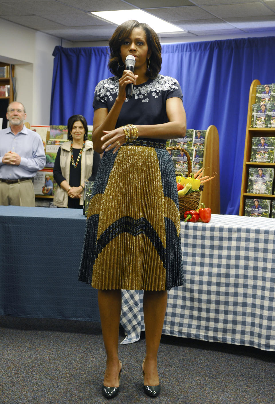 US First Lady Michelle Obama speaks during a book signing event of her book 'American Grown: The Story of the White House Kitchen Garden and Gardens Across America,' at Politics & Prose in Washington, DC, on May 7, 2013. Photo credit:  JEWEL SAMAD/AFP/Getty Images
