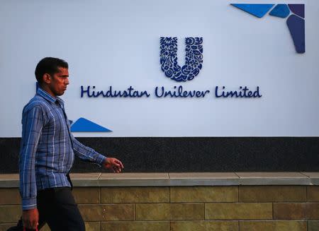 A pedestrian walks past the Hindustan Unilever Limited (HUL) headquarters in Mumbai January 19, 2015. REUTERS/Danish Siddiqui