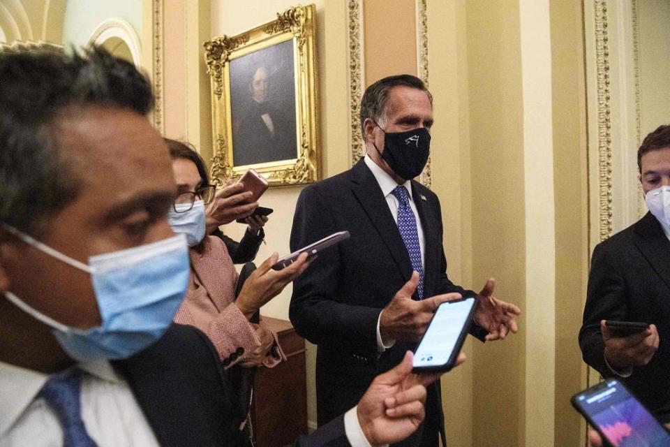 Republican Senator from Utah Mitt Romney speaks to reporters outside the Senate Chamber at the US Capitol in Washington, DC, on September 21, 2020.