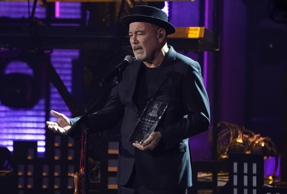 Ruben Blades accepts the person of the year award at the 22nd annual Latin Grammy Awards on Thursday, Nov. 18, 2021, at the MGM Grand Garden Arena in Las Vegas. (AP Photo/Chris Pizzello)