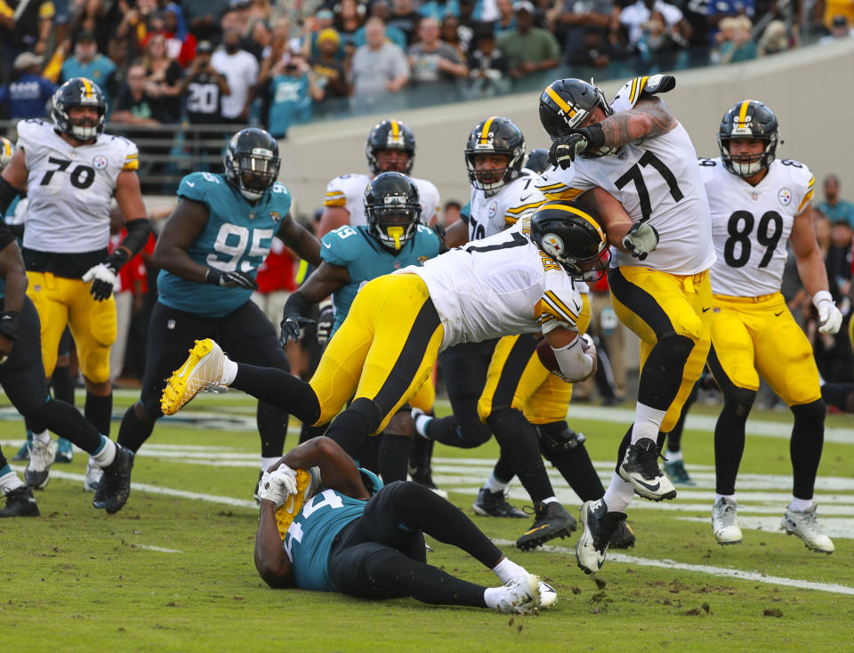 <p>Ben Roethlisberger #7 of the Pittsburgh Steelers dives for the go-ahead touchdown during the second half against the Jacksonville Jaguars at TIAA Bank Field on November 18, 2018 in Jacksonville, Florida. (Photo by Scott Halleran/Getty Images) </p>