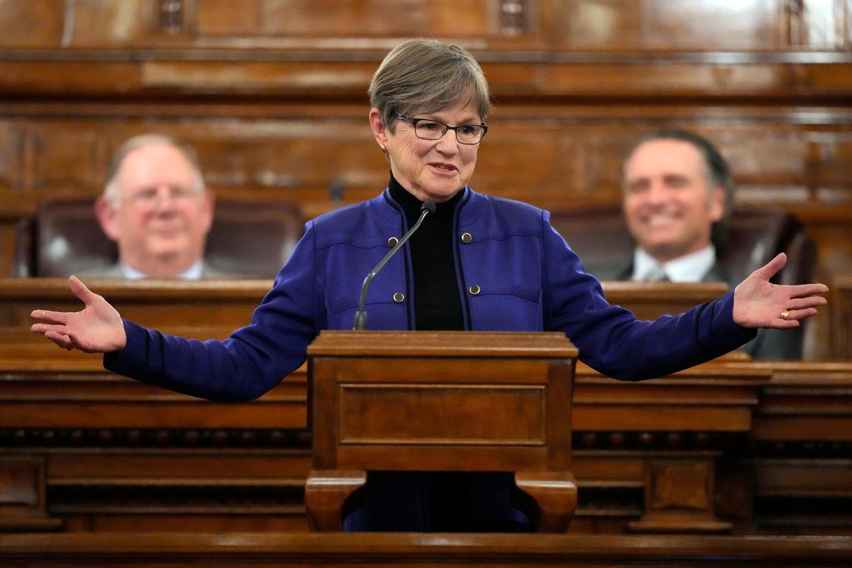 Kansas Gov. Laura Kelly, responding to the veto of a special Oklahoma license plate for the University of Kansas, said KU grads living in Oklahoma were welcome to return any time.