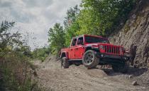 <p>The 2020 Jeep Gladiator looks and performs best in Rubicon trim, which lifts the truck's body and includes beefy 33-inch-tall all-terrain tires. Other highlights include locking front and rear differentials, an electronically disconnecting front anti-roll bar, and special terrain-specific drive modes that help the Gladiator slog through nearly anything. Read the full story <a href="https://www.caranddriver.com/reviews/a29281410/2020-jeep-gladiator-rubicon-by-the-numbers/" rel="nofollow noopener" target="_blank" data-ylk="slk:here;elm:context_link;itc:0;sec:content-canvas" class="link ">here</a>.</p>