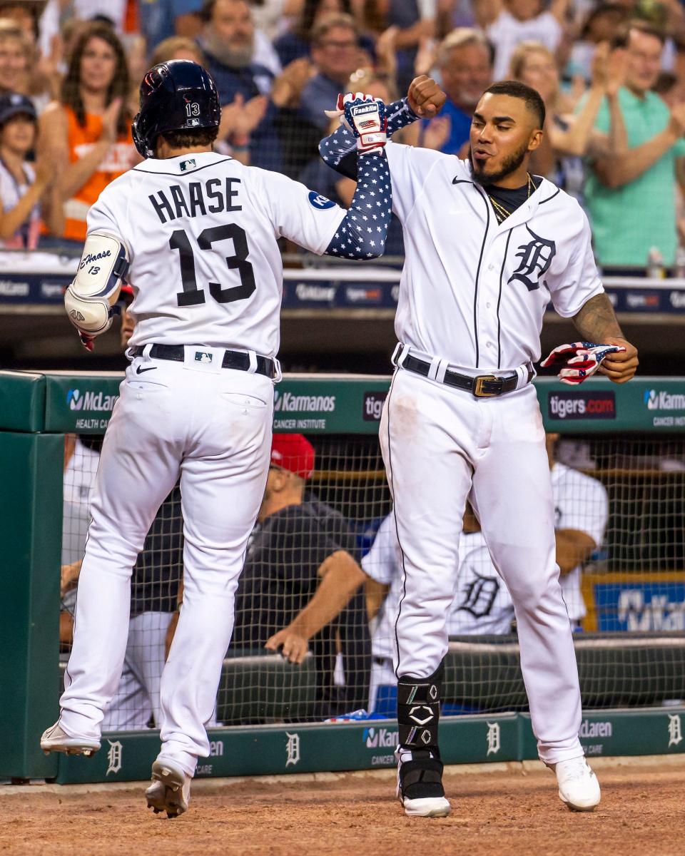Tigers catcher Eric Haase celebrates with third baseman Harold Castro, right, after hitting a solo home run during the seventh inning of Game 2 of the doubleheader on Monday, July 4, 2022, at Comerica Park.