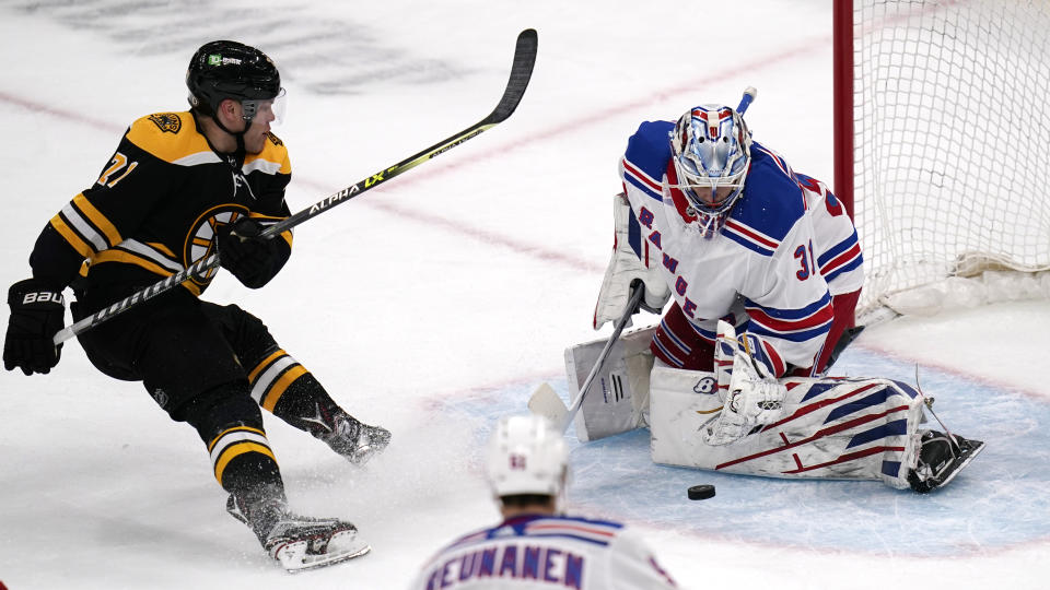 New York Rangers goaltender Igor Shesterkin (31) makes a save on a shot by Boston Bruins left wing Taylor Hall (71) during the third period of an NHL hockey game, Saturday, May 8, 2021, in Boston. (AP Photo/Charles Krupa)