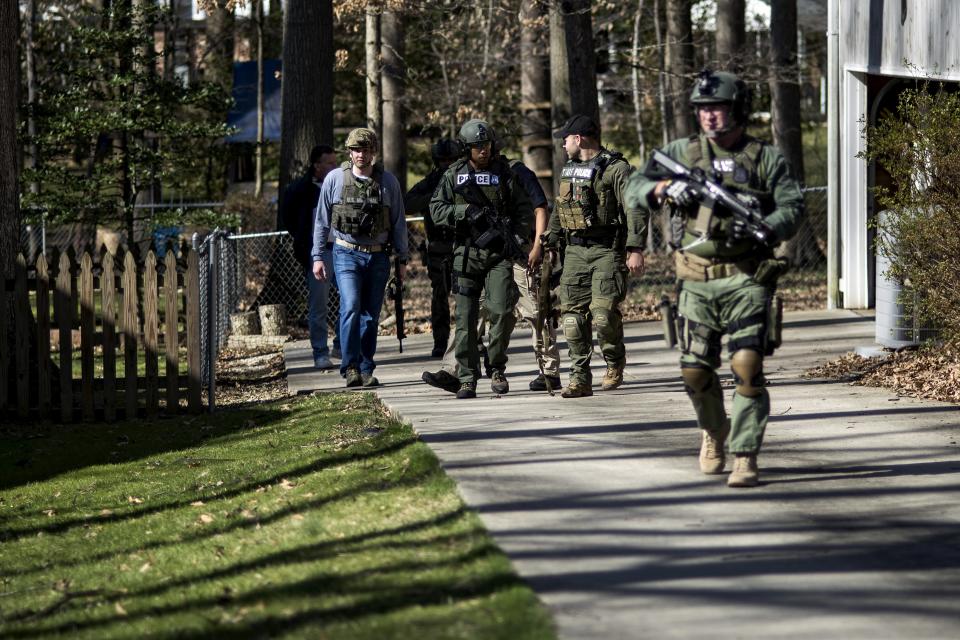 Police hunt for accused bank robber Wossen Assaye, who escaped Inova Fairfax Hospital early Tuesday in Fairfax, Virginia March 31, 2015. The armed prisoner who escaped from a hospital in Fairfax County in northern Virginia on Tuesday has been captured in Washington, D.C., local police said. (REUTERS/James Lawler Duggan)