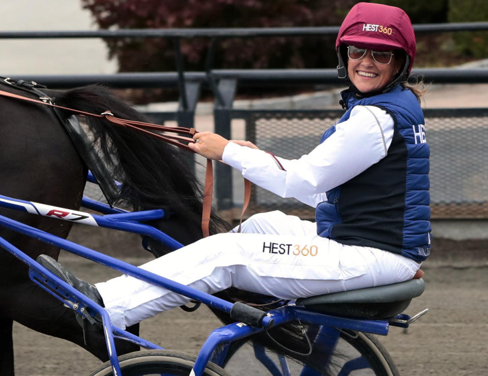 FILE - In this Thursday, Aug. 23, 2018 file photo, Norway's Princess Martha Louise during her exam race to become a licensed trotting driver, in Oslo. The Princess passed her exam. As the British royal family wrestles with the future roles of Prince Harry and his wife Meghan, it could look to Europe for examples of how princes and princesses have tried to carve out careers away from the pomp and ceremony of their families’ traditional duties. Princess Martha Louise, the oldest of King Harald’s children and fourth in line to the throne, gave up the "royal highness" part of her title in 2002 when she married Norwegian writer Ari Behn. (Lise Aserud/NTB Scanpix via AP, File)