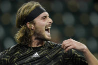 Stefanos Tsitsipas, of Greece, celebrates after winning a point against Alex de Minaur, of Australia, at the BNP Paribas Open tennis tournament Wednesday, Oct. 13, 2021, in Indian Wells, Calif. (AP Photo/Mark J. Terrill)