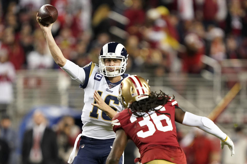 Los Angeles Rams quarterback Jared Goff (16) throws a pass as San Francisco 49ers defensive back Marcell Harris (36) applies pressure during the second half of an NFL football game in Santa Clara, Calif., Saturday, Dec. 21, 2019. (AP Photo/Tony Avelar)