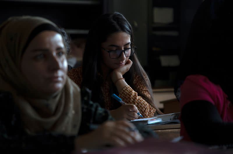 Students attend a Kurdish language class at a school in Qamishli