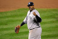 CC Sabathia #52 of the New York Yankees reacts after Mark Reynolds #12 of the Baltimore Orioles grounded out for the final out in the bottom of the eighth inning during Game One of the American League Division Series at Oriole Park at Camden Yards on October 7, 2012 in Baltimore, Maryland. (Photo by Patrick McDermott/Getty Images)