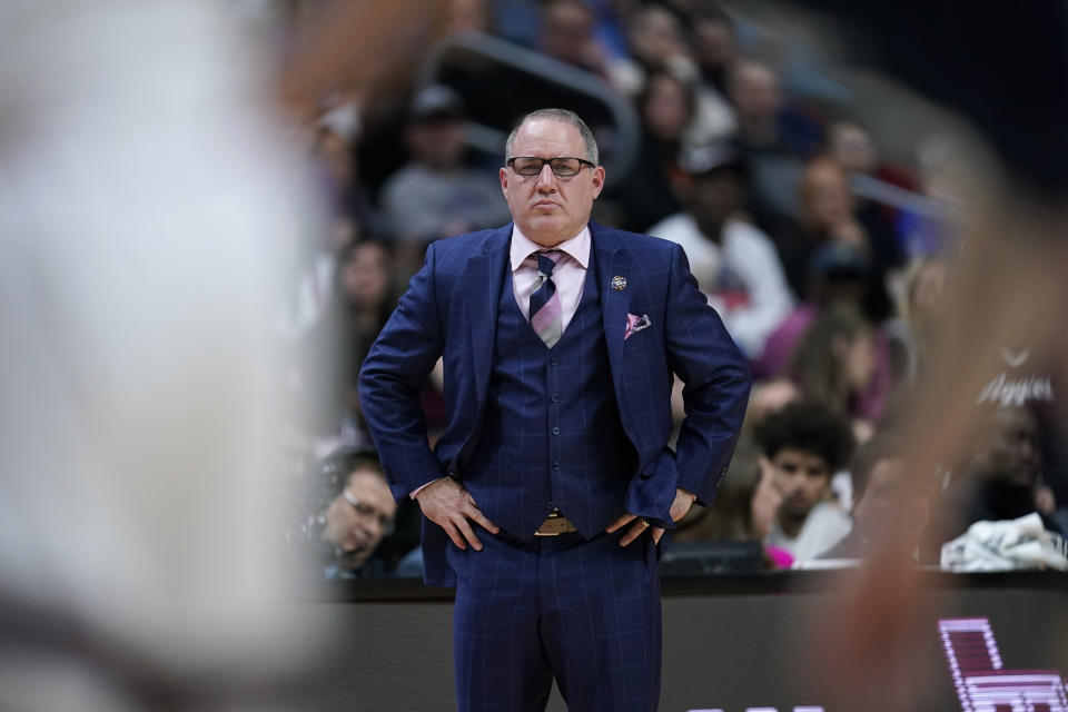 Texas A&M head coach Buzz Williams watches from the bench in the first half of a first-round college basketball game against Penn State in the NCAA Tournament, Thursday, March 16, 2023, in Des Moines, Iowa. (AP Photo/Charlie Neibergall)