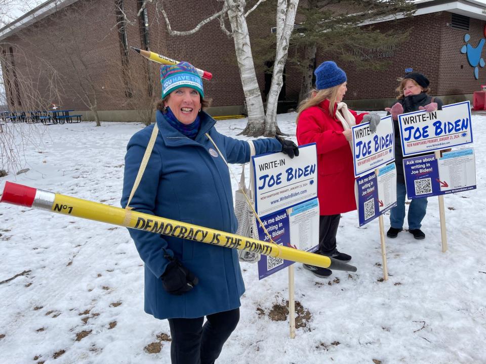 Portsmouth resident Julie Robb supports the Joe Biden write-in campaign outside the New Hampshire primary polls at Little Harbour School in Portsmouth Tuesday, Jan. 23, 2024.