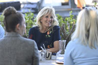 US First Lady Jill Biden smiles as she meets military surfers and their families in Newlyn, Cornwall, England, on the sidelines of the G7 summit, Saturday June 12, 2021. US First Lady Jill Biden met with veterans, first responders and family members of Bude Surf Veterans, a Cornwall-based volunteer organization that provides social support and surfing excursions for veterans, first responders and their families. (Daniel Leal-Olivas/Pool via AP)