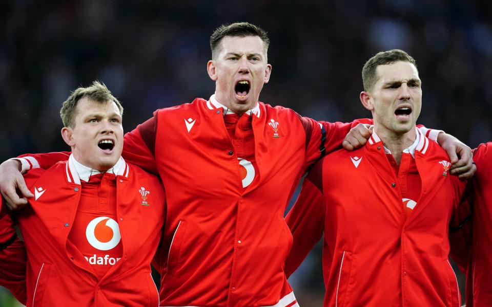 Wales players singing their national anthem before a Six Nations match at Twickenham