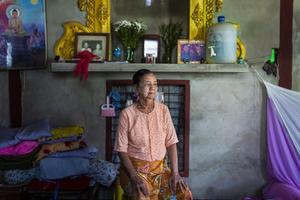 Daw San Aye, 72, poses for a portrait in Yangon division, Myanmar. She says life has improved since plastic has been introduced in the area. (Photo: Hkun Lat for HuffPost)