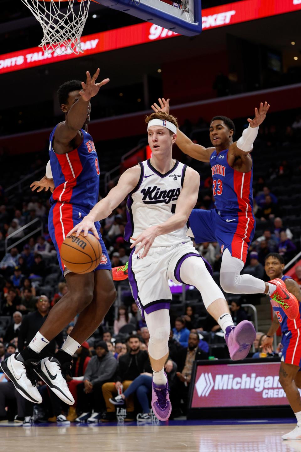 Kings guard Kevin Huerter passes Tuesday vs. the Pistons. The Kings won.