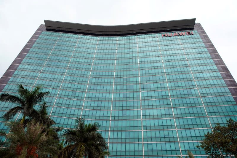 FILE PHOTO: A Huawei company logo is seen at the company headquarters in Shenzhen